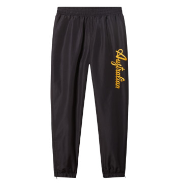 Pantalon lechute australien avec logo jaune tournesol | noir